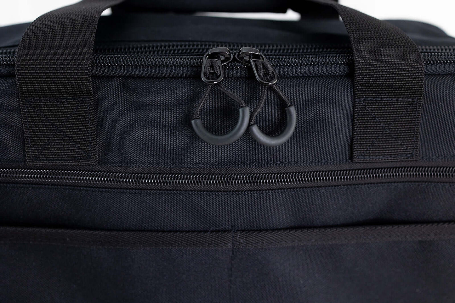 Nav & Co Flight Bag - Nav & Co zoomed in view of quality zips and pullers black